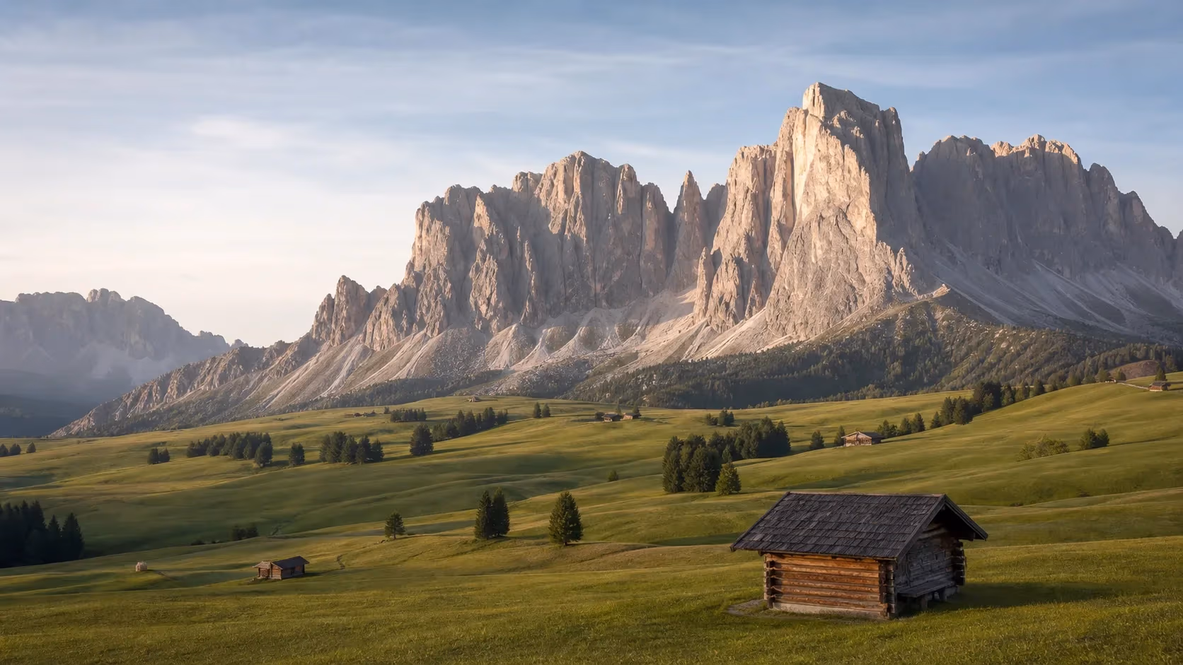 "Le pareti del Sassolungo sui prati dell'Alpe di Siusi al mattino"